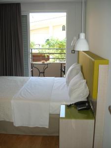 Postel nebo postele na pokoji v ubytování Elements Rooms & Apartments