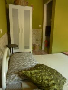Postel nebo postele na pokoji v ubytování B&B Cà Giovanni Country Resort