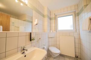 Koupelna v ubytování Hotel am Wasen