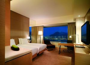 Cama ou camas em um quarto em Hyatt Regency Hong Kong, Sha Tin