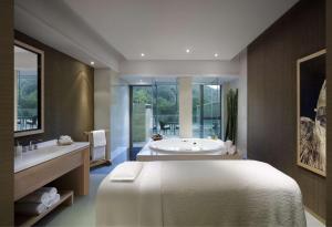 Cama ou camas em um quarto em Hyatt Regency Hong Kong, Sha Tin