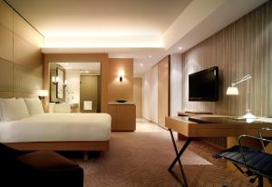 Uma TV ou centro de entretenimento em Hyatt Regency Hong Kong, Sha Tin