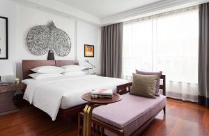 Postel nebo postele na pokoji v ubytování Park Hyatt Siem Reap + 37 fotografií