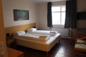 Ліжко або ліжка в номері North Star Hotel Olafsvik