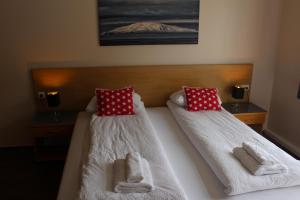 Ліжко або ліжка в номері North Star Hotel Olafsvik