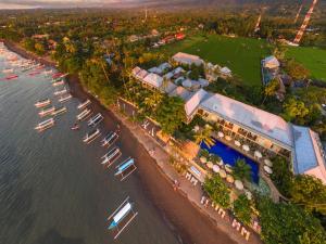 an aerial view of a harbor with boats in the water at The Lovina in Lovina