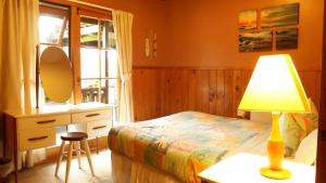 Postel nebo postele na pokoji v ubytování Relax a Lodge