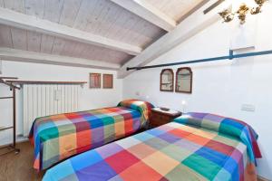 Llit o llits en una habitació de Appartamento Accademia San Vio