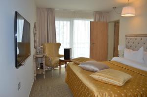 Μια τηλεόραση ή/και κέντρο ψυχαγωγίας στο Carmen International Hotel Venus - Fost Becali Hotel