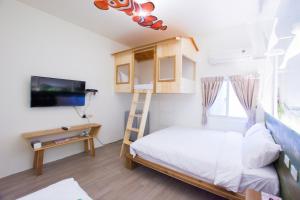 Letto o letti in una camera di 解憂海灣Chill Bay潛水旅店