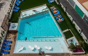Bazén v ubytování Hotel Arena Prado nebo v jeho okolí