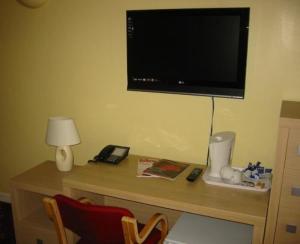 TV a/nebo společenská místnost v ubytování The Langham Hotel