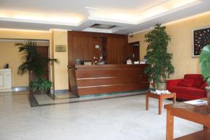 De lobby of receptie bij Santa Caterina Park Hotel