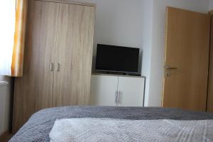 Postel nebo postele na pokoji v ubytování Apartment Warmuth