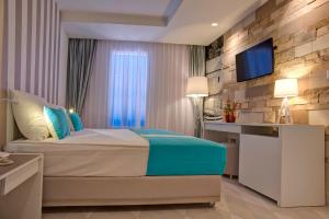 TV a/nebo společenská místnost v ubytování Hotel Aleksandar