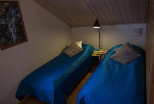 Vuode tai vuoteita majoituspaikassa Lapland Villa