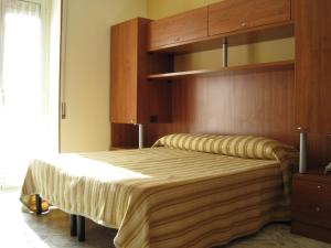 Ліжко або ліжка в номері Albergo Di Piero
