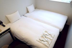 Voodi või voodid majutusasutuse CVS Bay Hotel New Building toas