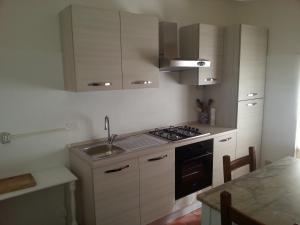 A kitchen or kitchenette at B&B I Canonici