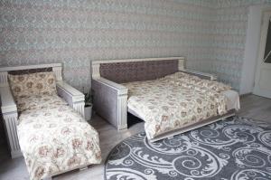 מיטה או מיטות בחדר ב-Apartment Glebova