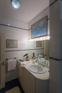 a bathroom with a sink and a mirror at B&B La Stradetta in Bologna