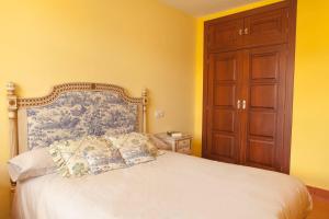 Postel nebo postele na pokoji v ubytování Casa Roble