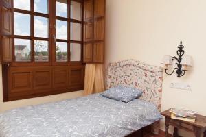 Postel nebo postele na pokoji v ubytování Casa Roble
