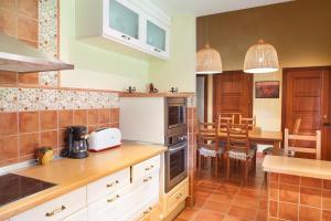 Kuchyň nebo kuchyňský kout v ubytování Casa Roble