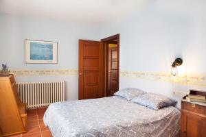 Postel nebo postele na pokoji v ubytování Casa Roble