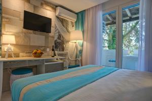 Postel nebo postele na pokoji v ubytování Hotel Aleksandar