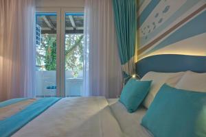 Postel nebo postele na pokoji v ubytování Hotel Aleksandar