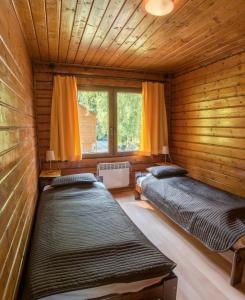 Postel nebo postele na pokoji v ubytování Złoty Potok Resort