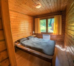 Postel nebo postele na pokoji v ubytování Złoty Potok Resort + 37 fotografií