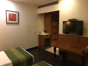 Postel nebo postele na pokoji v ubytování Hotel Ivory 32
