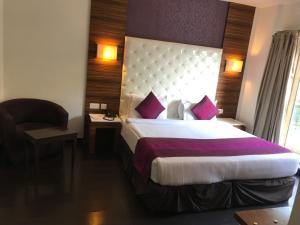 Postel nebo postele na pokoji v ubytování Hotel Ivory 32