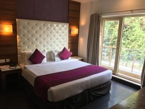 Postel nebo postele na pokoji v ubytování Hotel Ivory 32