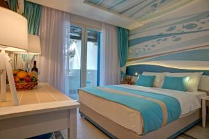 Postel nebo postele na pokoji v ubytování Hotel Aleksandar