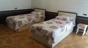 Postel nebo postele na pokoji v ubytování Royal Boutique Hotel on Kievyan