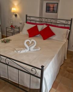Ліжко або ліжка в номері Le Sette Perle