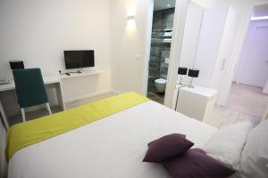 Televisyen dan/atau pusat hiburan di Hotel Boutique Libris