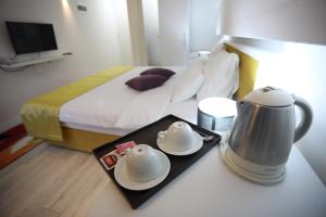 Katil atau katil-katil dalam bilik di Hotel Boutique Libris