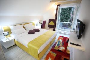 Katil atau katil-katil dalam bilik di Hotel Boutique Libris