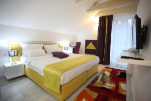 Katil atau katil-katil dalam bilik di Hotel Boutique Libris