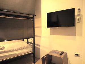 Postel nebo postele na pokoji v ubytování Daan Park Hotel
