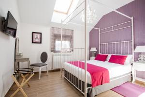 Postel nebo postele na pokoji v ubytování Casa Rural Pico de los Haces + 22 fotografií