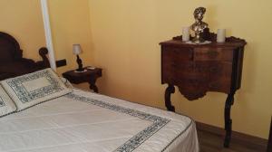 Posteľ alebo postele v izbe v ubytovaní Casa Tiburcio