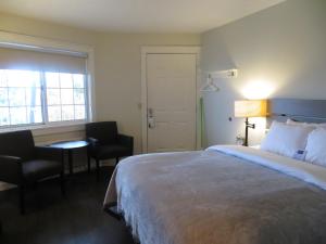 Katil atau katil-katil dalam bilik di Brio Beach Inn