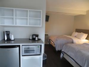 Kuchyň nebo kuchyňský kout v ubytování Brio Beach Inn