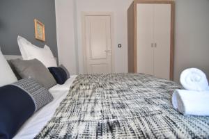 Postel nebo postele na pokoji v ubytování Apartamento Recogidas 39
