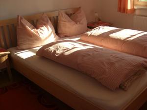 Posteľ alebo postele v izbe v ubytovaní Ferienwohnung Prader